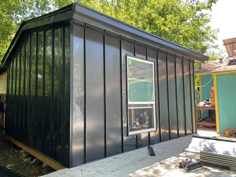 Black standing seam metal wall panels for Metal Roof Installation in Cambria